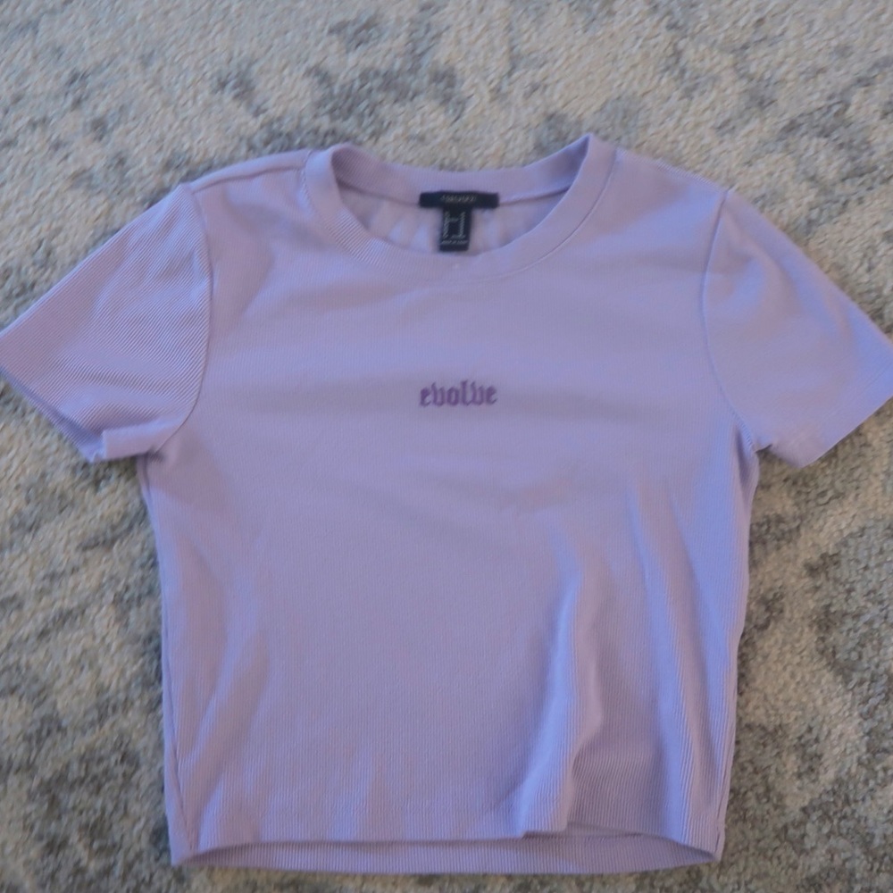 Tight purple shirt.